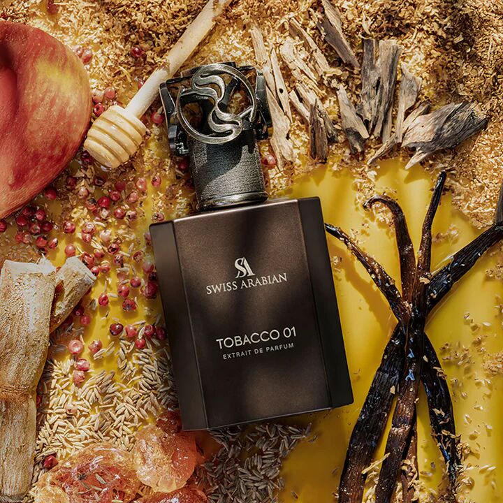 ARABSKI PERFUM TOBACCO 01 SWISS ARABIAN - Śliwka, Jabłko, Lukrecja, Kminek i Pieprz Różowy; Labdanum, Ambra, Paczuli i Ylang Ylang; Tytoń, Miód, Wanilia, Piżmo, Sandalowiec i Drewno Kaszmirowe.