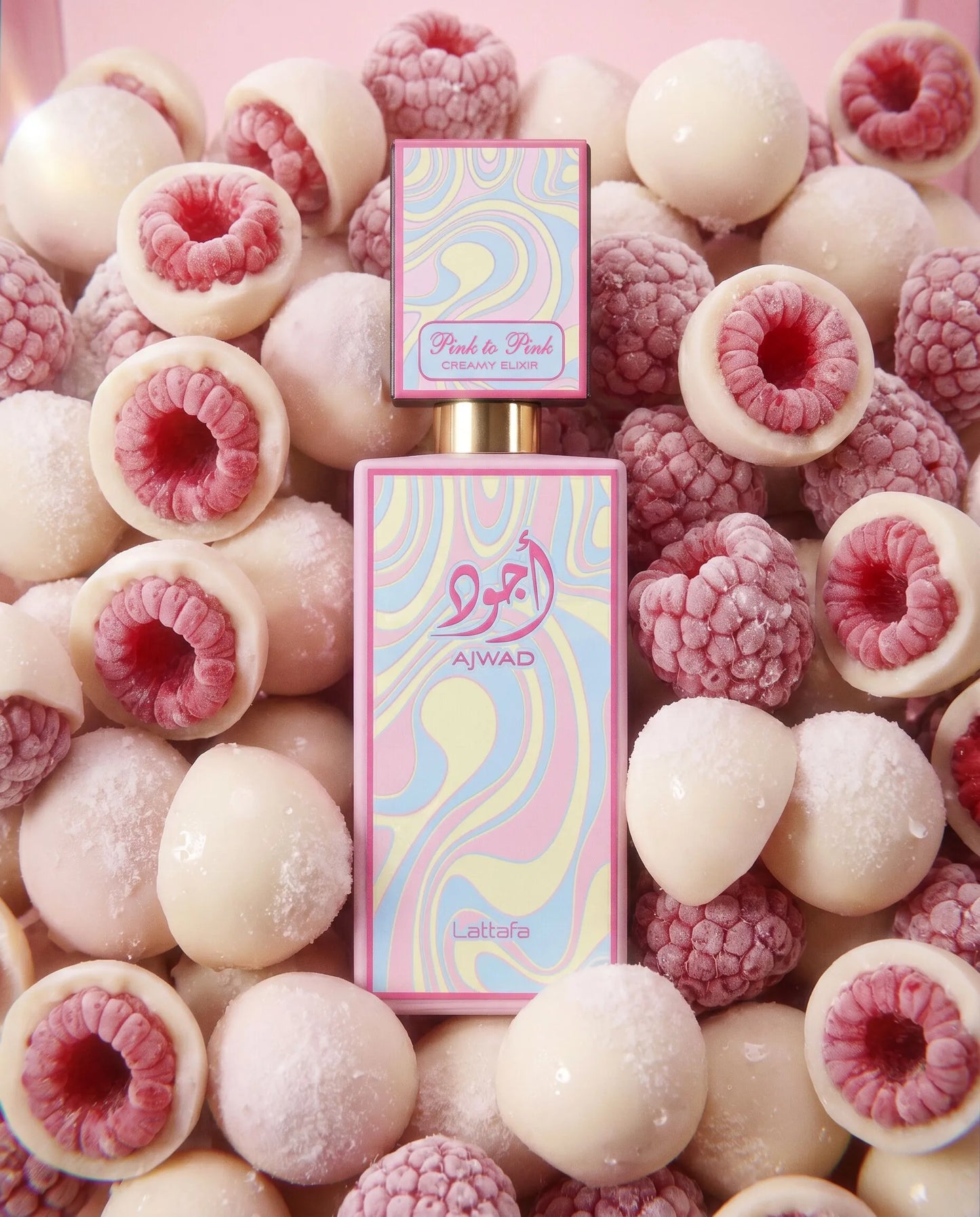LATTAFA AJWAD PINK CREAMY ELIXIR-Ribes Nero, Lampone e Pera; Cioccolato Bianco;Baccello di Vaniglia, Amberwood e Muschio.