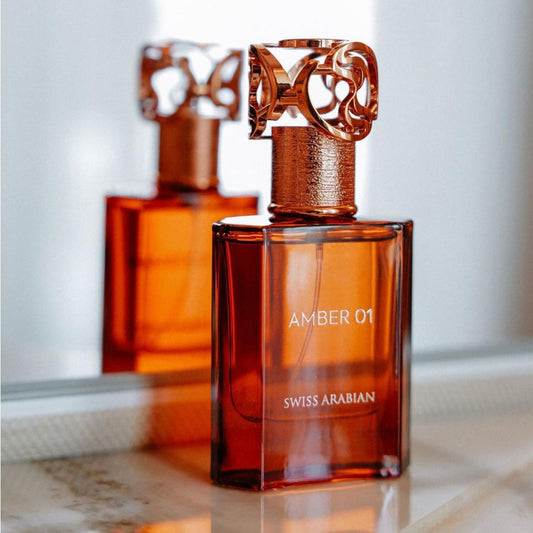 AMBER 01 SWISS ARABIAN-Pepe Nero e Mandarino; Rosa, Gelsomino e Cashmeran; Patchouli, Ambra, Legno di Cedro e Vaniglia.