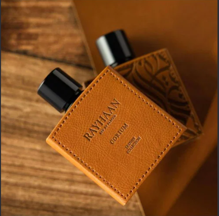 RAYHAAN CORIUM LEATHER 100ML-gemello di Stronger With You Leather-Castagna, Spezie e Elemi, Salvia;Vaniglia, Cuoio e Legno di Agar (Oud).