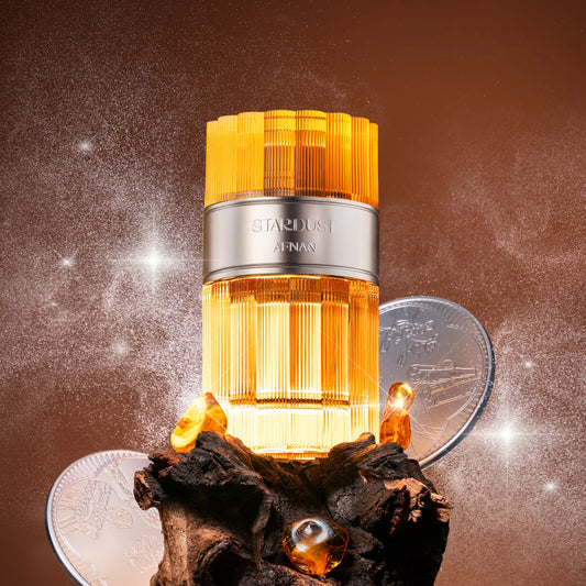 AFNAN STARDUST EXTRAIT 100ML-Aldeidi, Bergamotto, Pompelmo, Arancia e Mandarino;Cannella, Cognac e Caramello;Mirra, Sandalo, Ambra, Fava Tonka, Note Legnose, Quercia e Muschio.