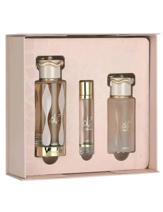 GIFT SET LATTAFA TERIAQ 3 PEZZI-Caramello, Mandorla Amara, Albicocca e Pepe Rosa; Miele, Rabarbaro, Fiori Bianchi e Rosa; Cuoio, Vaniglia, Muschio, Labdano e Vetiver.